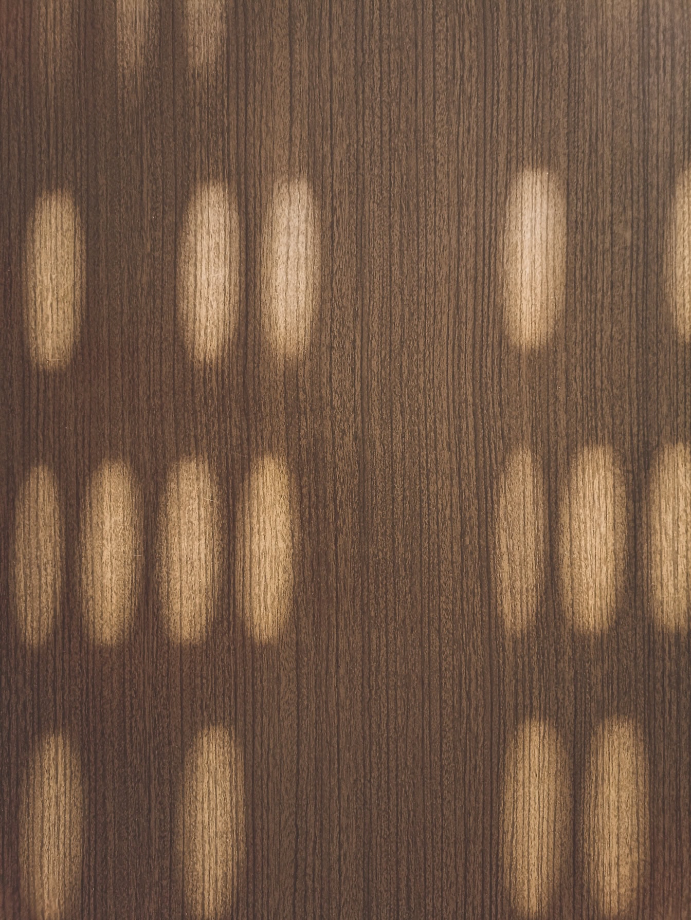 Brown wooden surface with shadow, a texture of light brown wood panel