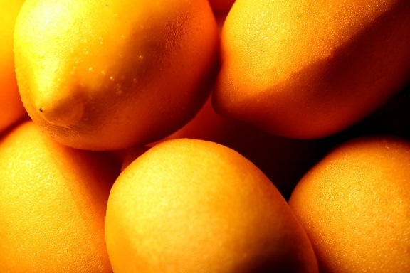 Limones amarillos brillantes, vitamina