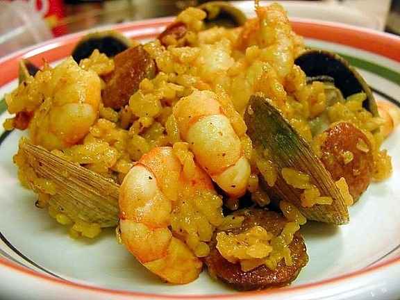 paella, shrimp, clams, sausages, rice