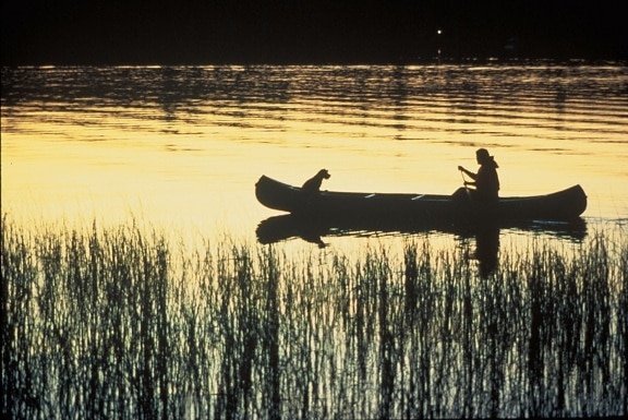 Kanotpaddling, solnedgång