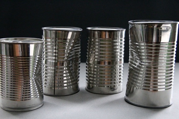 four, unlabeled, metal, cans, unknown, food