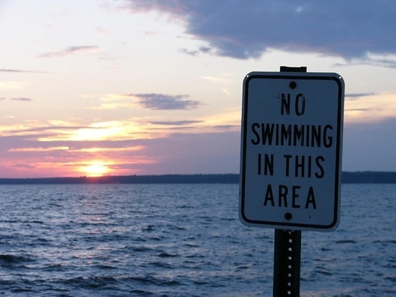 la natación, el signo