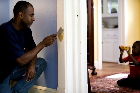 African American, father, process, repairing, interior, door, frame