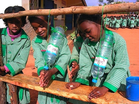 girls, madagascar, simple, hand washing, device, consists, hanging, water