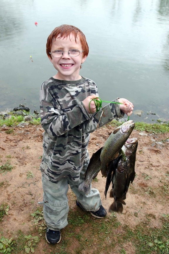 happy, boy, glasses, fishing, proudly, holding, fish, catch