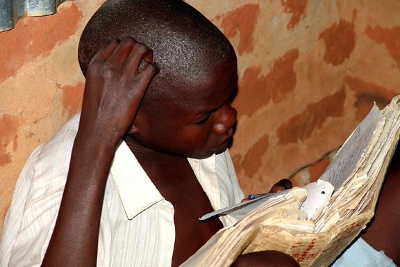 young, African, boy, studying