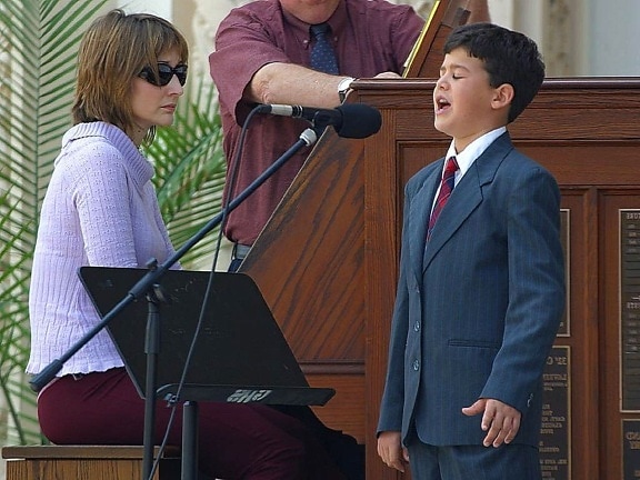 young boy, singing