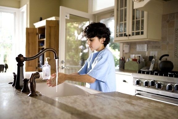 young boy, shown, process, washing, hands, kitchen, sink