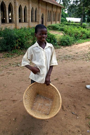 young, happy, Afro boy, carrying, basket