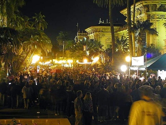 balboa, park, crowds, nighttime, palm trees, lights