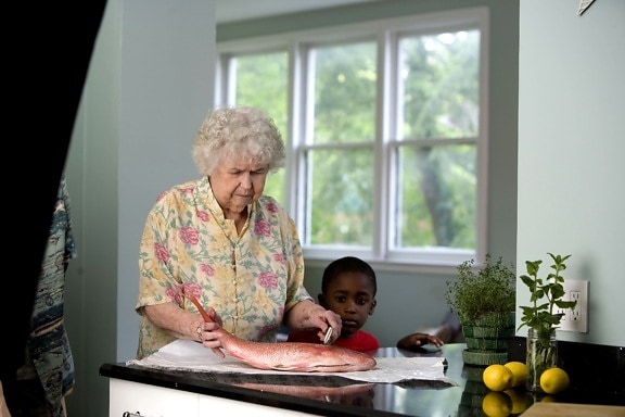 elderly, woman, process, preparing, fresh, fish, clean, kitchen, counter