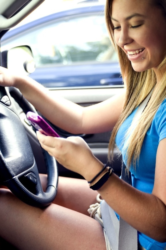 nice, teenage girl, driving, attempting, text, one, friends