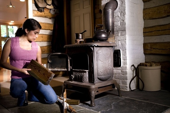 woman, special, care, safely, operate, wood, burning, stove