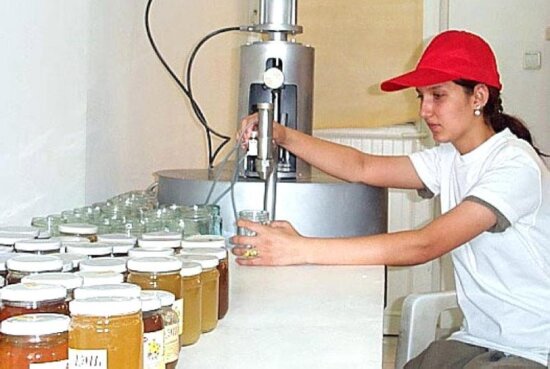 young female, worker, bottles, honey, jars, sterilized, equipment