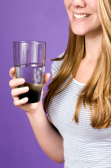 young woman, holding, glass, water, hand