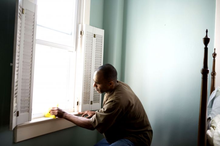 African American, damp, sponge, window