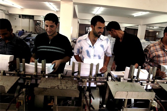 print, factory, baghdad, workers, assemble, textbooks, printed, sixth, grade, math