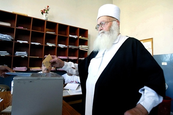 Lebanon, elderly, man, casting, ballot