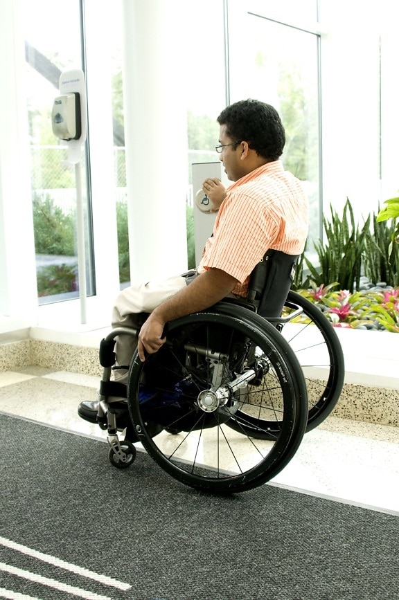 sitting, wheelchair, process, exiting, building
