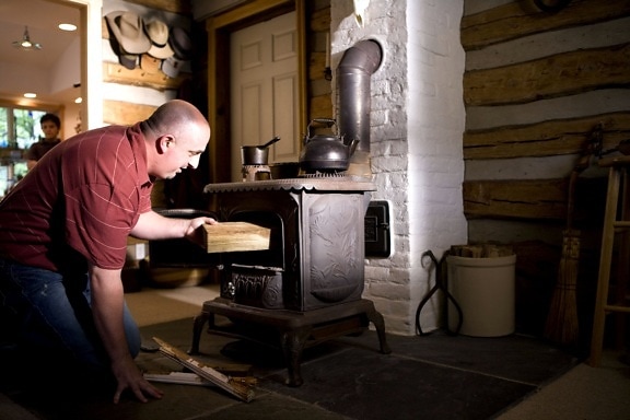 man, place, appears, piece, treated, lumber, stove, fuel