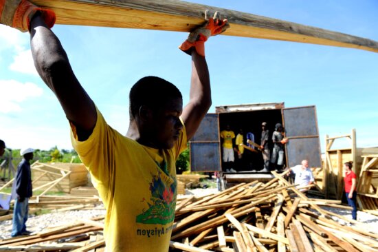 workers, prepare, materials, transitional, shelters, Leogane, Haiti