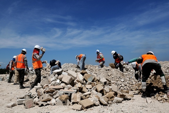 workers, sort, rubble, port, Prince, Haiti