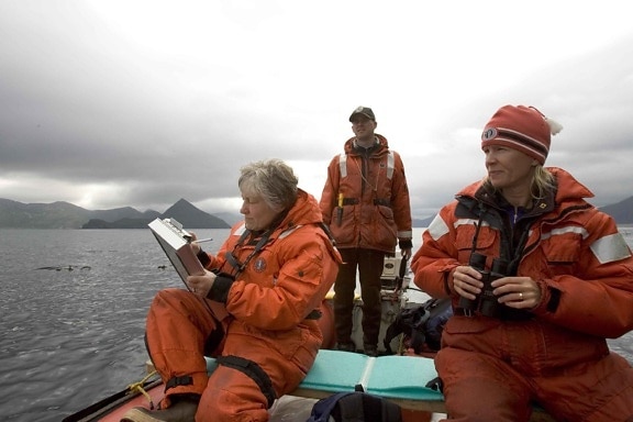 one, male, two females, boat, research, crew