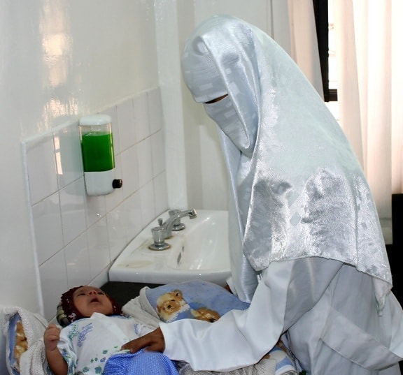 Yemen, doctor, examine, infant
