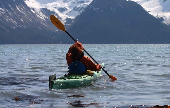female, kayaker, paddles