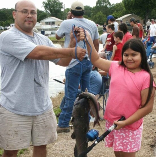 father, daughter, hold, fish
