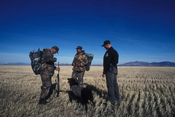 service, law, enforcement, officer, speaks, two, duck, hunters, dog