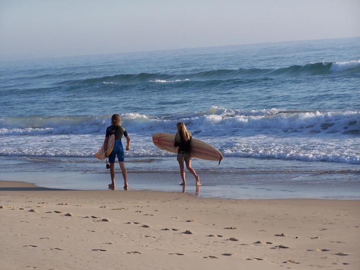 Surfers, beach