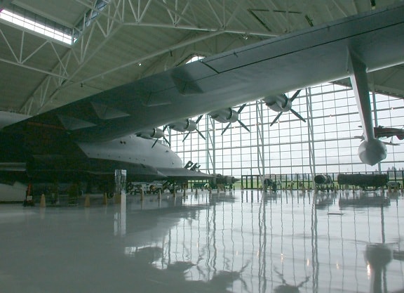avión, hangar