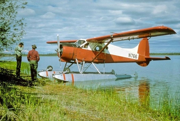 float, aircraft, shore, poeople, beside