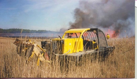 heavy, tracked, vehicle, tall, grass, prescribed, burn