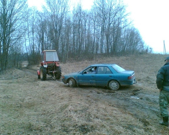 muddy, road, tractor, pulling, car